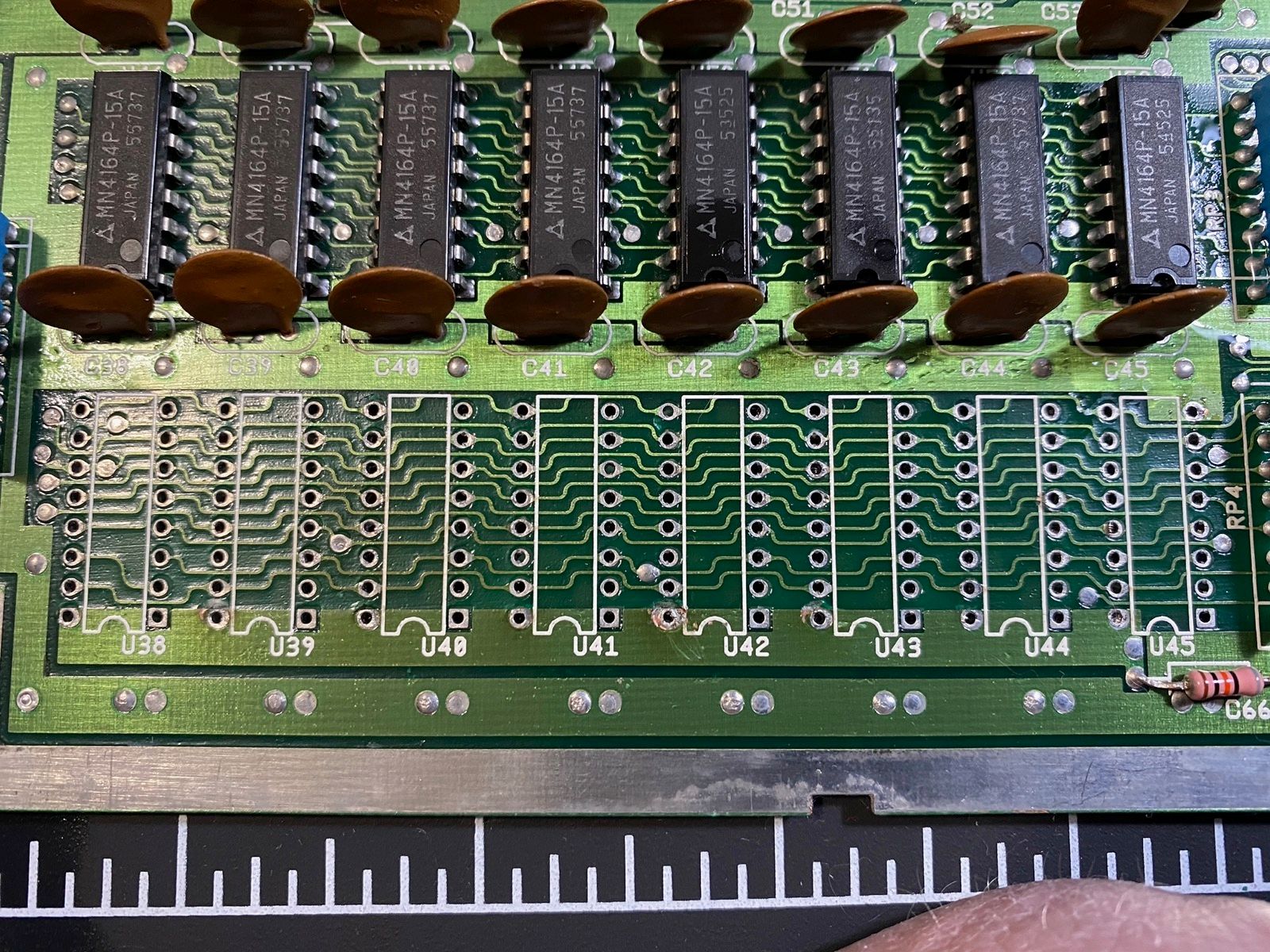 Came off pretty cleanly. I eventually decided to do the upper bank and all of these ceramic capacitors while I was at it