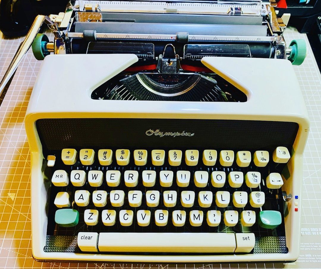 My near-mint Olympia SM7 (1961 edition) has a carrying case and requires no power. In the event of a global catastrophe, I can still write books.